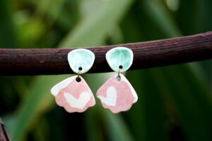 Dangling porcelain earrings with two hearts