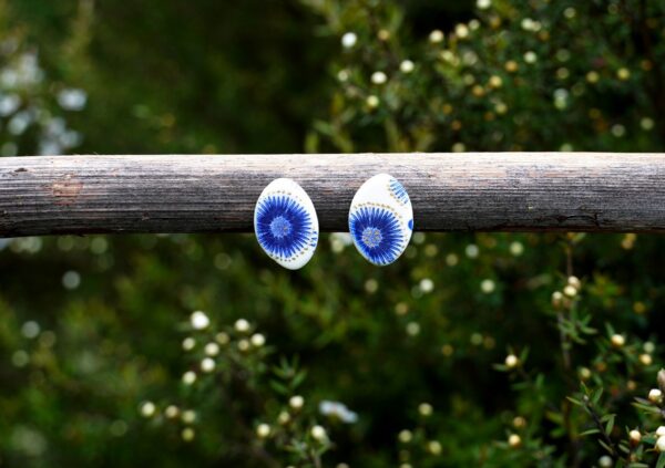 Each piece is handmade from porcelain clay and fired twice or three times in the kiln around 1200 degrees. Pottery is my passion and I love to discover new techniques, glazes, oxides or materials to play with and make extraordinary high quality jewellery. I also use hypoallergenic stainless steel and silver studs/hooks.