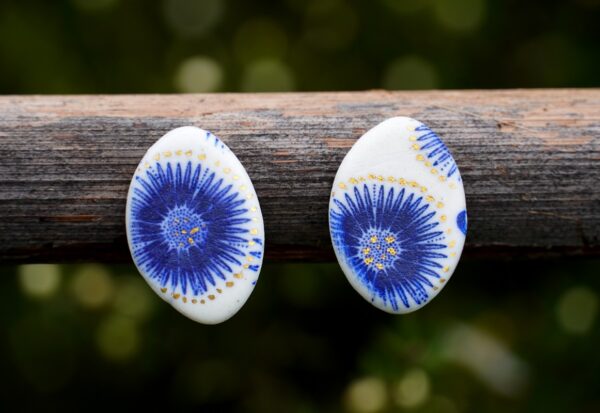 Each piece is handmade from porcelain clay and fired twice or three times in the kiln around 1200 degrees. Pottery is my passion and I love to discover new techniques, glazes, oxides or materials to play with and make extraordinary high quality jewellery. I also use hypoallergenic stainless steel and silver studs/hooks.
