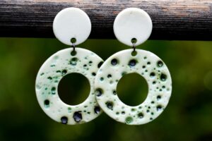 Each piece is handmade from porcelain clay and fired twice or three times in the kiln around 1200 degrees. Pottery is my passion and I love to discover new techniques, glazes, oxides or materials to play with and make extraordinary high quality jewellery. I also use hypoallergenic stainless steel and silver studs/hooks.