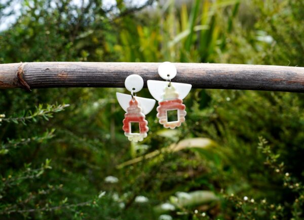 Each piece is handmade from porcelain clay and fired twice or three times in the kiln around 1200 degrees. Pottery is my passion and I love to discover new techniques, glazes, oxides or materials to play with and make extraordinary high quality jewellery. I also use hypoallergenic stainless steel and silver studs/hooks.