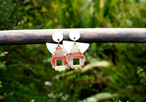 Each piece is handmade from porcelain clay and fired twice or three times in the kiln around 1200 degrees. Pottery is my passion and I love to discover new techniques, glazes, oxides or materials to play with and make extraordinary high quality jewellery. I also use hypoallergenic stainless steel and silver studs/hooks.