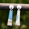 Each piece is handmade from porcelain clay and fired twice or three times in the kiln around 1200 degrees. Pottery is my passion and I love to discover new techniques, glazes, oxides or materials to play with and make extraordinary high quality jewellery. I also use hypoallergenic stainless steel and silver studs/hooks.