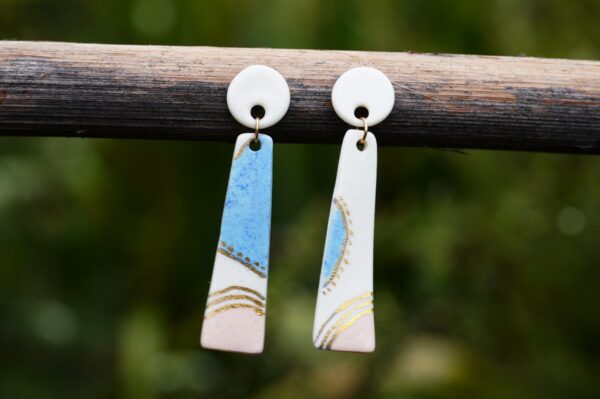 Each piece is handmade from porcelain clay and fired twice or three times in the kiln around 1200 degrees. Pottery is my passion and I love to discover new techniques, glazes, oxides or materials to play with and make extraordinary high quality jewellery. I also use hypoallergenic stainless steel and silver studs/hooks.