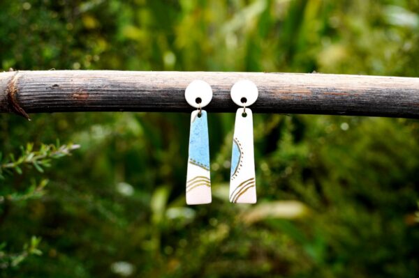 Each piece is handmade from porcelain clay and fired twice or three times in the kiln around 1200 degrees. Pottery is my passion and I love to discover new techniques, glazes, oxides or materials to play with and make extraordinary high quality jewellery. I also use hypoallergenic stainless steel and silver studs/hooks.