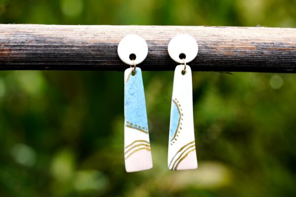 Each piece is handmade from porcelain clay and fired twice or three times in the kiln around 1200 degrees. Pottery is my passion and I love to discover new techniques, glazes, oxides or materials to play with and make extraordinary high quality jewellery. I also use hypoallergenic stainless steel and silver studs/hooks.