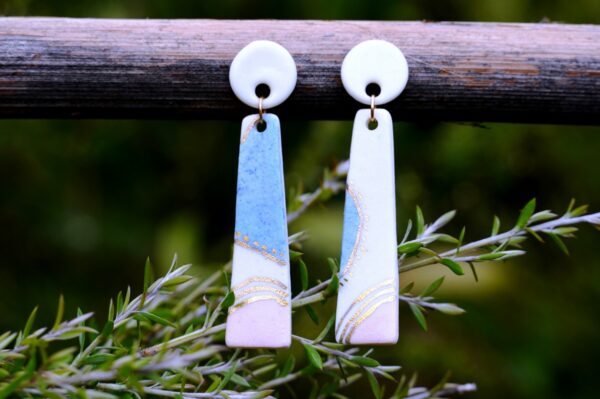 Each piece is handmade from porcelain clay and fired twice or three times in the kiln around 1200 degrees. Pottery is my passion and I love to discover new techniques, glazes, oxides or materials to play with and make extraordinary high quality jewellery. I also use hypoallergenic stainless steel and silver studs/hooks.