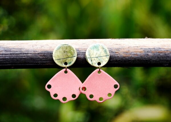 Each piece is handmade from porcelain clay and fired twice or three times in the kiln around 1200 degrees. Pottery is my passion and I love to discover new techniques, glazes, oxides or materials to play with and make extraordinary high quality jewellery. I also use hypoallergenic stainless steel and silver studs/hooks.