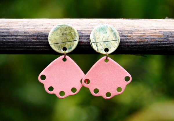 Each piece is handmade from porcelain clay and fired twice or three times in the kiln around 1200 degrees. Pottery is my passion and I love to discover new techniques, glazes, oxides or materials to play with and make extraordinary high quality jewellery. I also use hypoallergenic stainless steel and silver studs/hooks.