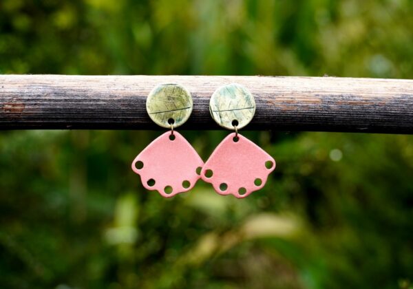 Each piece is handmade from porcelain clay and fired twice or three times in the kiln around 1200 degrees. Pottery is my passion and I love to discover new techniques, glazes, oxides or materials to play with and make extraordinary high quality jewellery. I also use hypoallergenic stainless steel and silver studs/hooks.