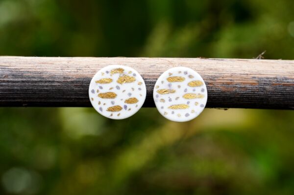 Each piece is handmade from porcelain clay and fired twice or three times in the kiln around 1200 degrees. Pottery is my passion and I love to discover new techniques, glazes, oxides or materials to play with and make extraordinary high quality jewellery. I also use hypoallergenic stainless steel and silver studs/hooks.