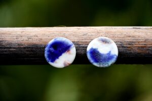 Each piece is handmade from porcelain clay and fired twice or three times in the kiln around 1200 degrees. Pottery is my passion and I love to discover new techniques, glazes, oxides or materials to play with and make extraordinary high quality jewellery. I also use hypoallergenic stainless steel and silver studs/hooks.