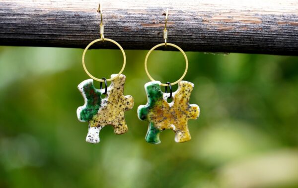 Each piece is handmade from porcelain clay and fired twice or three times in the kiln around 1200 degrees. Pottery is my passion and I love to discover new techniques, glazes, oxides or materials to play with and make extraordinary high quality jewellery. I also use hypoallergenic stainless steel and silver studs/hooks.
