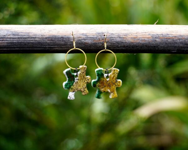 Each piece is handmade from porcelain clay and fired twice or three times in the kiln around 1200 degrees. Pottery is my passion and I love to discover new techniques, glazes, oxides or materials to play with and make extraordinary high quality jewellery. I also use hypoallergenic stainless steel and silver studs/hooks.