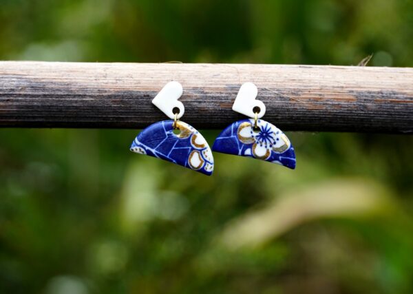 Each piece is handmade from porcelain clay and fired twice or three times in the kiln around 1200 degrees. Pottery is my passion and I love to discover new techniques, glazes, oxides or materials to play with and make extraordinary high quality jewellery. I also use hypoallergenic stainless steel and silver studs/hooks.