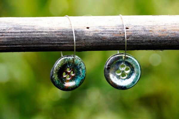 Each piece is handmade from porcelain clay and fired twice or three times in the kiln around 1200 degrees. Pottery is my passion and I love to discover new techniques, glazes, oxides or materials to play with and make extraordinary high quality jewellery. I also use hypoallergenic stainless steel and silver studs/hooks.