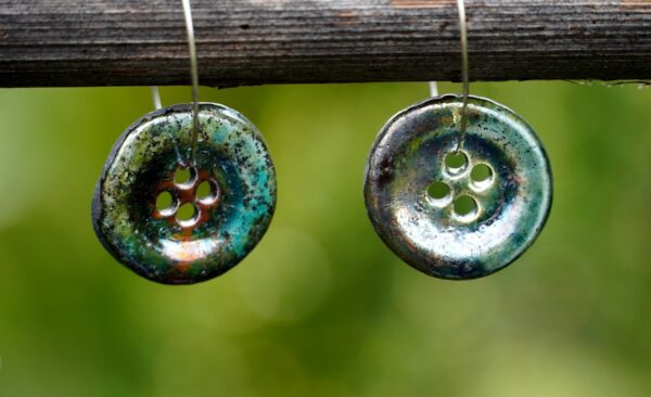 Each piece is handmade from porcelain clay and fired twice or three times in the kiln around 1200 degrees. Pottery is my passion and I love to discover new techniques, glazes, oxides or materials to play with and make extraordinary high quality jewellery. I also use hypoallergenic stainless steel and silver studs/hooks.