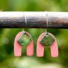Each piece is handmade from porcelain clay and fired twice or three times in the kiln around 1200 degrees. Pottery is my passion and I love to discover new techniques, glazes, oxides or materials to play with and make extraordinary high quality jewellery. I also use hypoallergenic stainless steel and silver studs/hooks.