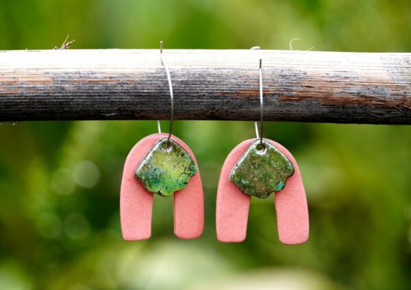 Each piece is handmade from porcelain clay and fired twice or three times in the kiln around 1200 degrees. Pottery is my passion and I love to discover new techniques, glazes, oxides or materials to play with and make extraordinary high quality jewellery. I also use hypoallergenic stainless steel and silver studs/hooks.