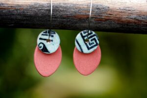 Each piece is handmade from porcelain clay and fired twice or three times in the kiln around 1200 degrees. Pottery is my passion and I love to discover new techniques, glazes, oxides or materials to play with and make extraordinary high quality jewellery. I also use hypoallergenic stainless steel and silver studs/hooks.