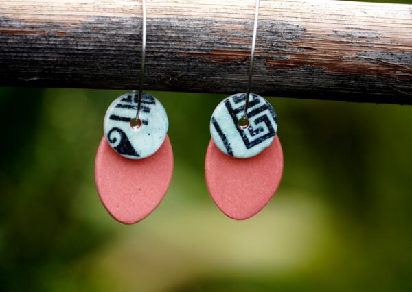 Each piece is handmade from porcelain clay and fired twice or three times in the kiln around 1200 degrees. Pottery is my passion and I love to discover new techniques, glazes, oxides or materials to play with and make extraordinary high quality jewellery. I also use hypoallergenic stainless steel and silver studs/hooks.