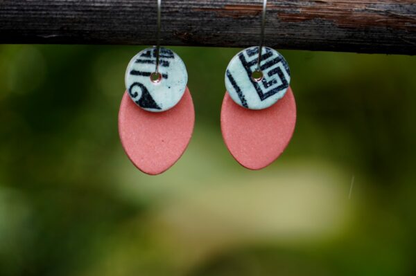 Each piece is handmade from porcelain clay and fired twice or three times in the kiln around 1200 degrees. Pottery is my passion and I love to discover new techniques, glazes, oxides or materials to play with and make extraordinary high quality jewellery. I also use hypoallergenic stainless steel and silver studs/hooks.