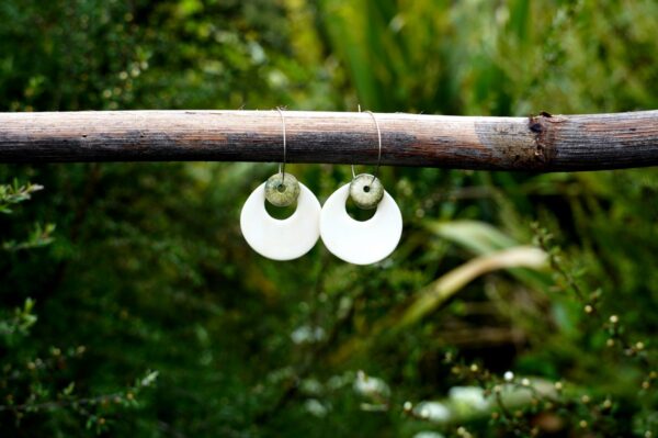 Each piece is handmade from porcelain clay and fired twice or three times in the kiln around 1200 degrees. Pottery is my passion and I love to discover new techniques, glazes, oxides or materials to play with and make extraordinary high quality jewellery. I also use hypoallergenic stainless steel and silver studs/hooks.