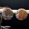Porcelain jewelry that tells a story – handcrafted black porcelain earrings using sgraffito technique.”Each piece is handmade from porcelain clay and fired twice or three times in the kiln around 1200 degrees. Pottery is my passion and I love to discover new techniques, glazes, oxides or materials to play with and make extraordinary high quality jewellery. I also use hypoallergenic stainless steel and silver studs/hooks.