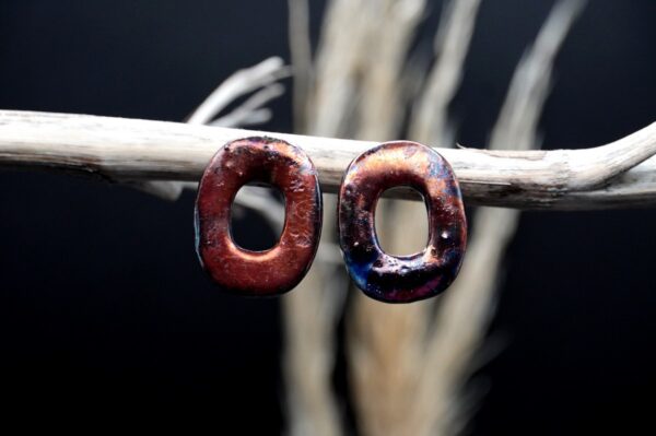 Each piece is handmade from porcelain clay and fired twice or three times in the kiln around 1200 degrees. Pottery is my passion and I love to discover new techniques, glazes, oxides or materials to play with and make extraordinary high quality jewellery. I also use hypoallergenic stainless steel and silver studs/hooks.