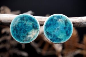 Each piece is handmade from porcelain clay and fired twice or three times in the kiln around 1200 degrees. Pottery is my passion and I love to discover new techniques, glazes, oxides or materials to play with and make extraordinary high quality jewellery. I also use hypoallergenic stainless steel and silver studs/hooks.