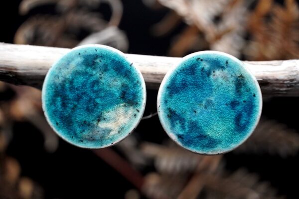 Each piece is handmade from porcelain clay and fired twice or three times in the kiln around 1200 degrees. Pottery is my passion and I love to discover new techniques, glazes, oxides or materials to play with and make extraordinary high quality jewellery. I also use hypoallergenic stainless steel and silver studs/hooks.