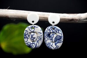 Each piece is handmade from porcelain clay and fired twice or three times in the kiln around 1200 degrees. Pottery is my passion and I love to discover new techniques, glazes, oxides or materials to play with and make extraordinary high quality jewellery. I also use hypoallergenic stainless steel and silver studs/hooks.