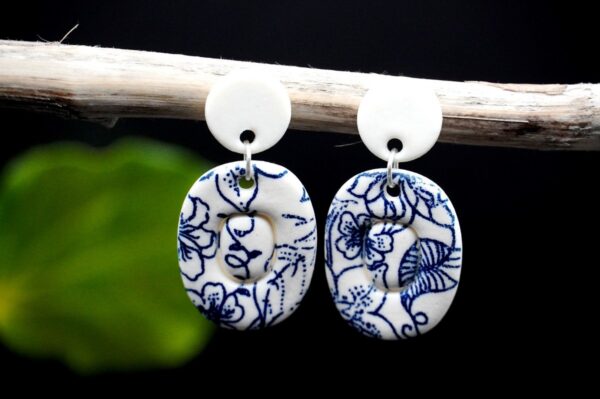 Each piece is handmade from porcelain clay and fired twice or three times in the kiln around 1200 degrees. Pottery is my passion and I love to discover new techniques, glazes, oxides or materials to play with and make extraordinary high quality jewellery. I also use hypoallergenic stainless steel and silver studs/hooks.