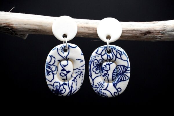 Each piece is handmade from porcelain clay and fired twice or three times in the kiln around 1200 degrees. Pottery is my passion and I love to discover new techniques, glazes, oxides or materials to play with and make extraordinary high quality jewellery. I also use hypoallergenic stainless steel and silver studs/hooks.