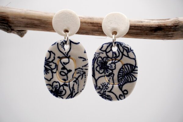 Each piece is handmade from porcelain clay and fired twice or three times in the kiln around 1200 degrees. Pottery is my passion and I love to discover new techniques, glazes, oxides or materials to play with and make extraordinary high quality jewellery. I also use hypoallergenic stainless steel and silver studs/hooks.