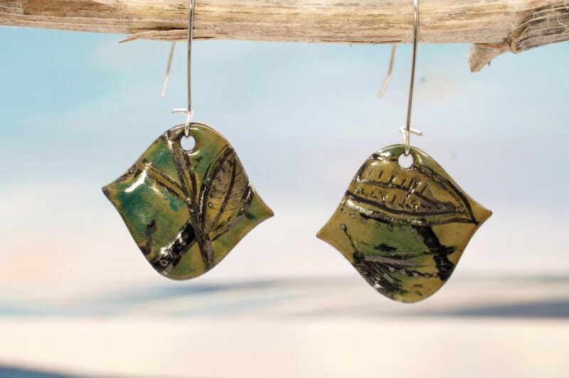 Each piece is handmade from porcelain clay and fired twice or three times in the kiln around 1200 degrees. Pottery is my passion and I love to discover new techniques, glazes, oxides or materials to play with and make extraordinary high quality jewellery. I also use hypoallergenic stainless steel and silver studs/hooks.
