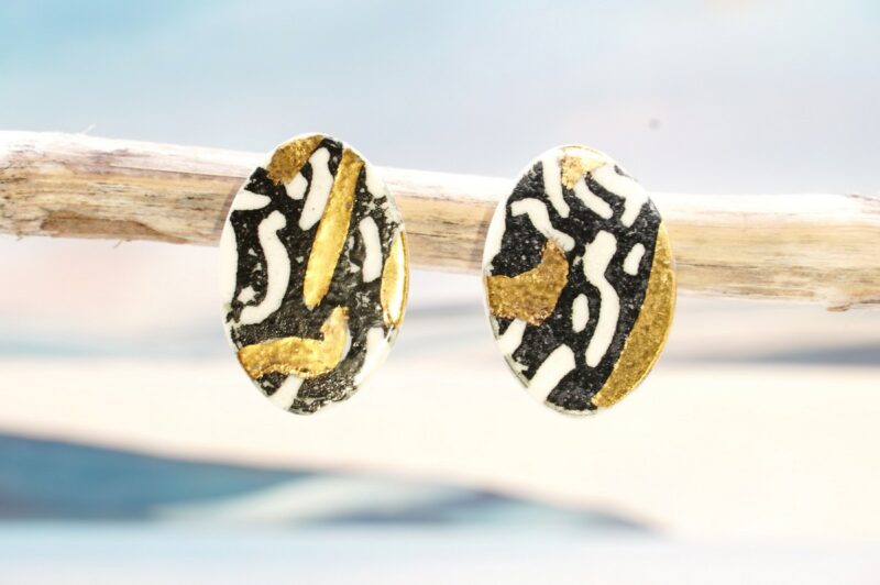 Each piece is handmade from porcelain clay and fired twice or three times in the kiln around 1200 degrees. Pottery is my passion and I love to discover new techniques, glazes, oxides or materials to play with and make extraordinary high quality jewellery. I also use hypoallergenic stainless steel and silver studs/hooks.