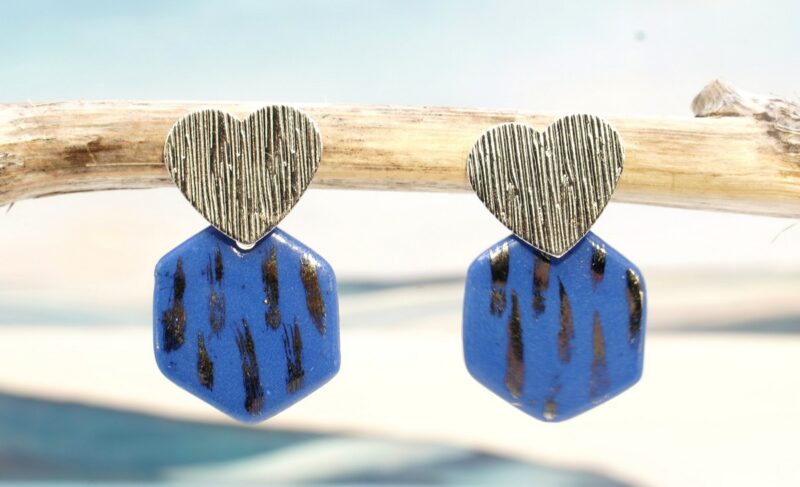 Each piece is handmade from porcelain clay and fired twice or three times in the kiln around 1200 degrees. Pottery is my passion and I love to discover new techniques, glazes, oxides or materials to play with and make extraordinary high quality jewellery. I also use hypoallergenic stainless steel and silver studs/hooks.