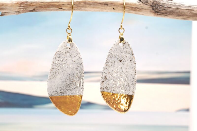 Each piece is handmade from porcelain clay and fired twice or three times in the kiln around 1200 degrees. Pottery is my passion and I love to discover new techniques, glazes, oxides or materials to play with and make extraordinary high quality jewellery. I also use hypoallergenic stainless steel and silver studs/hooks.